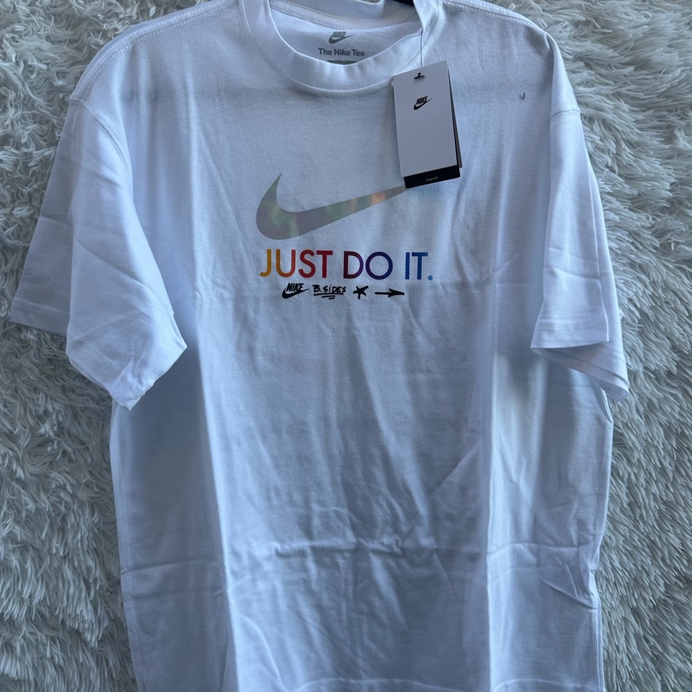 Nike Men's White Tee with Multicolor Logo